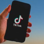 tiktok, tik tok, app, smartphone, iphone, tik tok banned, screen, mobile, technology, sky, nature, tik tok china, palm